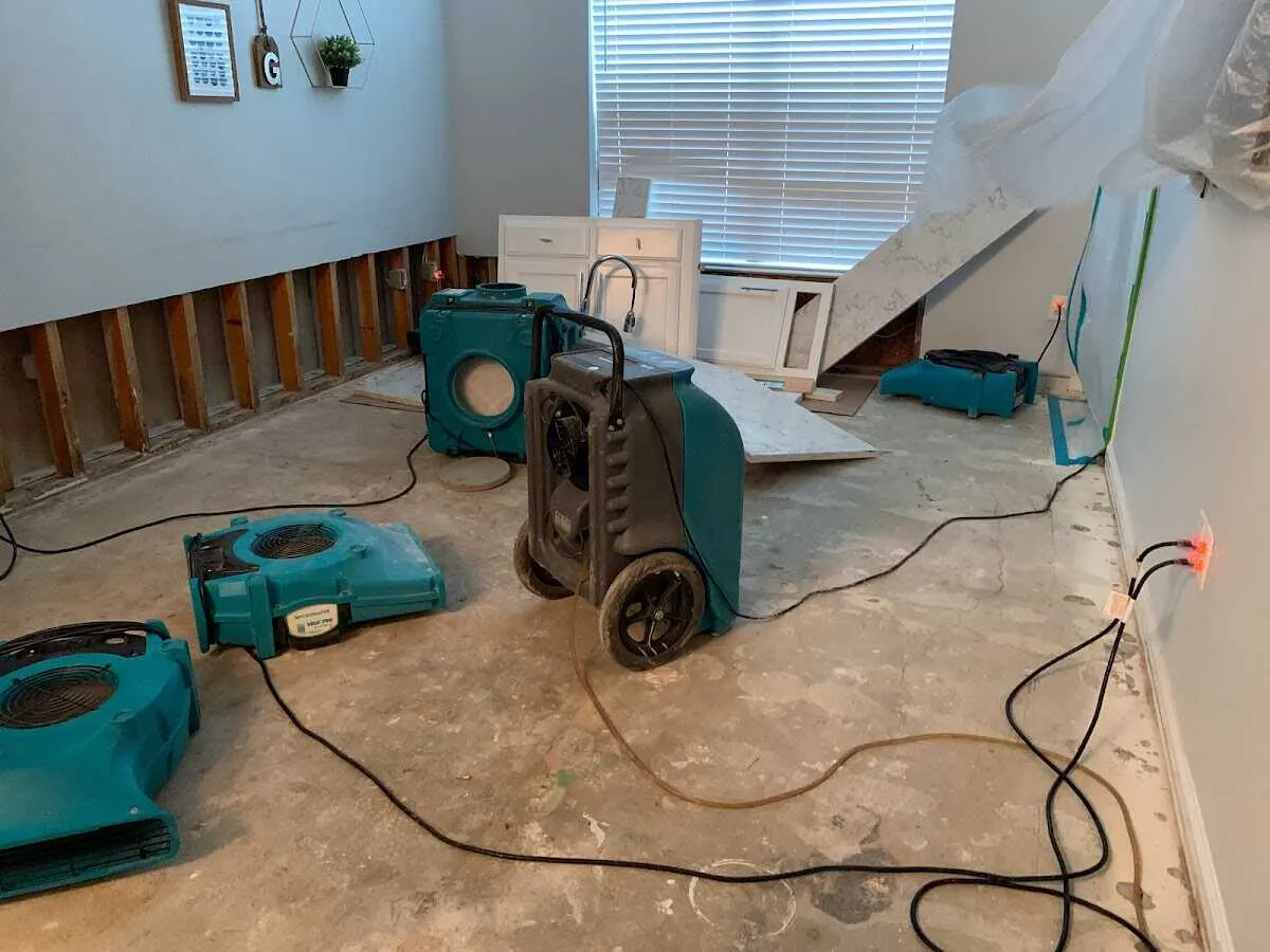 Dehumidifier in flood-cut room for Water Damage Restoration in Devils Lake